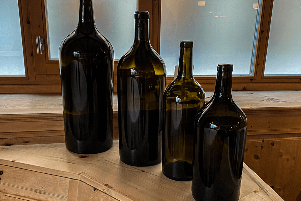Como armazenar o vinho depois de aberto: garrafas de diferentes tamanhos.